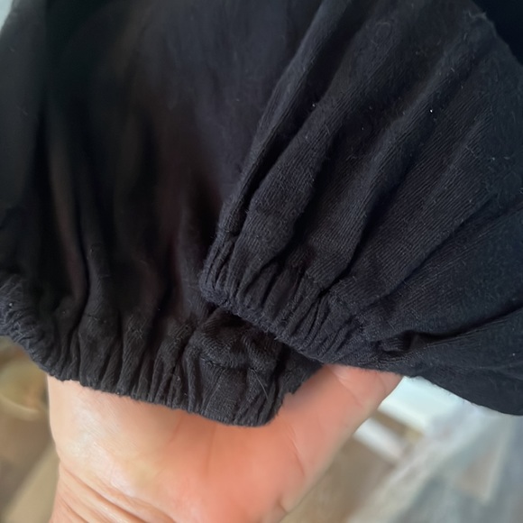 ASOS DESIGN mini swing dress with shoulder ruffle and daisy embroidery black 8 - Picture 4 of 8